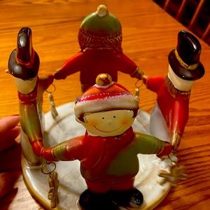 Yankee candle candle holder.  Snowmen and kids